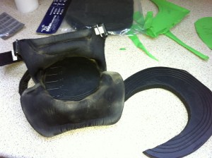 4. Then stuff the pad into the boot. This fitted first time but also revealed why the boots are awkward to get on--the moulded rubber heel bumper curves inwards to cup the heel, but getting the heel past it while the boot is going on is an adventure to say the least.